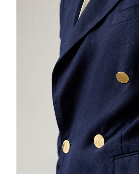 Debuted as a men's sporting style in 19th-century Britain, the double-breasted jacket is one of  Ralph Lauren Lauren's enduring signatures. This version of the iconic Camden is crafted with rustic-yet-chic linen in a classic construction for season-spanning wear. Our signature polished buttons complete the look.