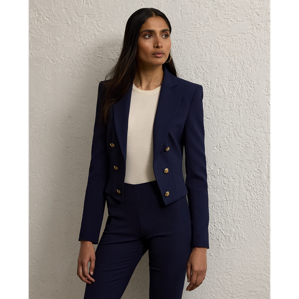 Inspired by one of Ricky Lauren’s personal tuxedo jackets, the Spencer is designed with a sleek cropped fit, a double-breasted silhouette and peak lapels. Italian-made, this style is woven with highly twisted crepe yarns selected for their lightweight feel and drape. Polished buttons embossed with  Ralph Lauren Lauren’s script monogram complete the look.