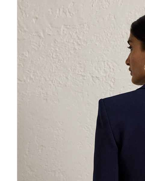 Inspired by one of Ricky Lauren’s personal tuxedo jackets, the Spencer is designed with a sleek cropped fit, a double-breasted silhouette and peak lapels. Italian-made, this style is woven with highly twisted crepe yarns selected for their lightweight feel and drape. Polished buttons embossed with  Ralph Lauren Lauren’s script monogram complete the look.