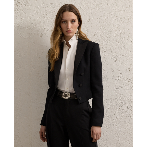 Inspired by one of Ricky Lauren’s personal tuxedo jackets, the Spencer is designed with a sleek cropped fit, a double-breasted silhouette and silk faille peak lapels. Italian-made, this style is woven with highly twisted crepe yarns for a modern drape and lightweight feel.