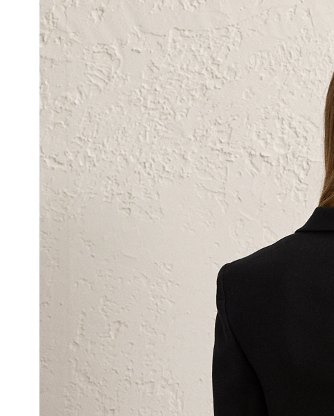 Inspired by one of Ricky Lauren’s personal tuxedo jackets, the Spencer is designed with a sleek cropped fit, a double-breasted silhouette and silk faille peak lapels. Italian-made, this style is woven with highly twisted crepe yarns for a modern drape and lightweight feel.