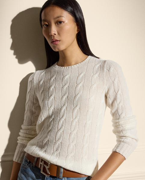 A timeless icon designed to stand the test of time, our Cradle to Cradle Certified (C2C Certified) Gold Cable-Knit Crewneck Jumper is knit with fine cashmere fibres sourced in Italy, dyed in rich hues and features a re-imagined cotton signature label. C2C certification is the global standard for products that are safe and circular. Ralph Lauren Lauren partnered with an independent assessment body to ensure that every component of this jumper meets the C2C Certified Product Standards set by the Cradle to Cradle Products Innovation Institute (C2CPII).