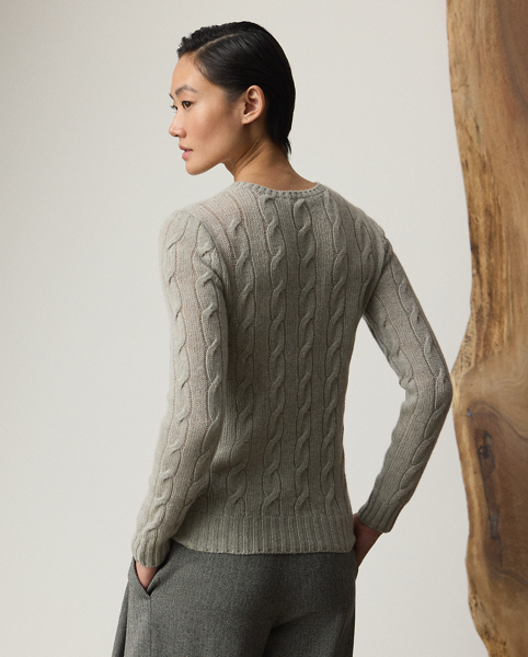 A timeless icon designed to stand the test of time, our Cradle to Cradle Certified (C2C Certified) Gold Cable-Knit Crewneck Jumper is knit with fine cashmere fibres sourced in Italy, dyed in rich hues and features a re-imagined cotton signature label. C2C certification is the global standard for products that are safe and circular. Ralph Lauren Lauren partnered with an independent assessment body to ensure that every component of this jumper meets the C2C Certified Product Standards set by the Cradle to Cradle Products Innovation Institute (C2CPII).