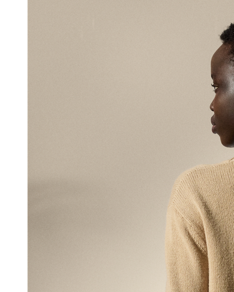 This lofty cashmere jumper depicts the Polo Bear in an outfit informed by the utility-inspired aesthetic of Pre-Spring 2025 Collection. A master embroiderer created the season’s Aviator Polo Bear from highly considered materials, including stretch silk charmeuse for the vibrant orange scarf, metallic satin for the jumpsuit, lambskin for the RL 888 bag and metallic thread for the jumpsuit zips, the bag’s “RL” hardware and the belt buckle. Hot-fixed rhinestones for the earrings complete the bear’s chic look.