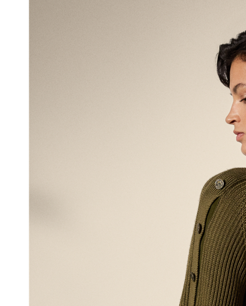 Spun with a luxurious blend of wool and silk yarns in a half-cardigan stitch, this crewneck jumper features flattering fashioning on the body and buttoned plackets down each sleeve. "RL" script-and-crown-engraved buttons complete the look.