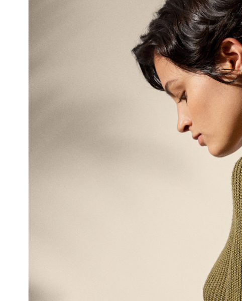 Spun with a luxurious blend of wool and silk yarns in a half-cardigan stitch, this crewneck jumper features flattering fashioning on the body and buttoned plackets down each sleeve. "RL" script-and-crown-engraved buttons complete the look.