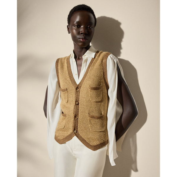 Crafted in Italy, this figure-skimming style updates the traditional waistcoat with genuine horn buttons, patch pockets and a rustic linen-and-silk construction, which is knitted at the front in a birdseye jacquard configuration to recreate a classic tweed visual.