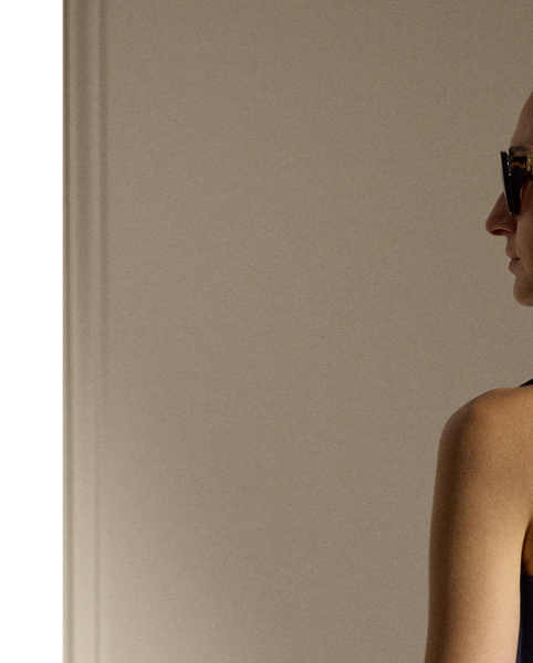 Crafted from lightweight, rib-knit cotton-blend jersey, which is valued for its optimal balance of softness and stretch, this essential tank top is finished with  Ralph Lauren Lauren's signature embroidered on the hem.