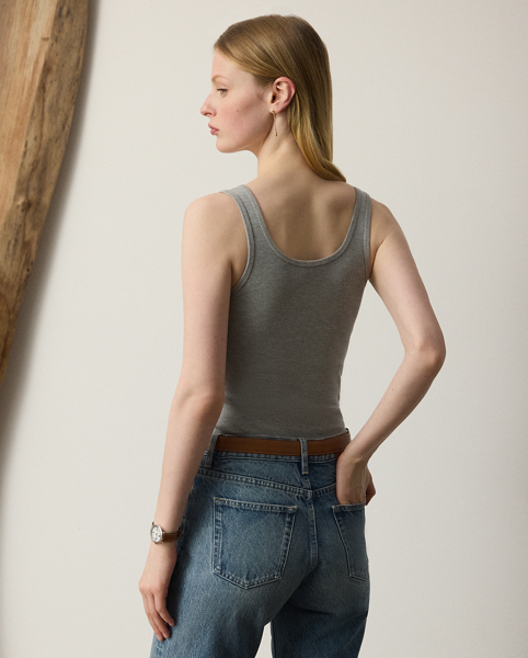 Crafted from lightweight, rib-knit cotton-blend jersey, which is valued for its optimal balance of softness and stretch, this essential tank top is finished with Ralph Lauren Lauren's signature embroidered on the hem.