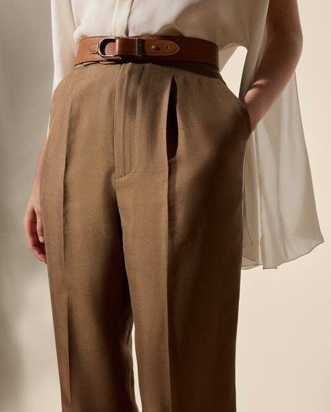 Traditionally tailored with leg creases and waist darts, this version of the mid-rise Evanne trouser is made with mulberry silk shantung – a fabrication woven with ultrafine slub yarn to create a rustic look and a soft hand.