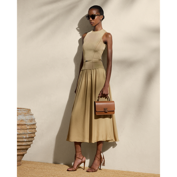 Crafted from our Italian double silk georgette, which is valued for its soft, delicate drape, the Kynlee skirt enhances the traditional A-line silhouette with asymmetrical pleats for sweeping movement and added dimension.