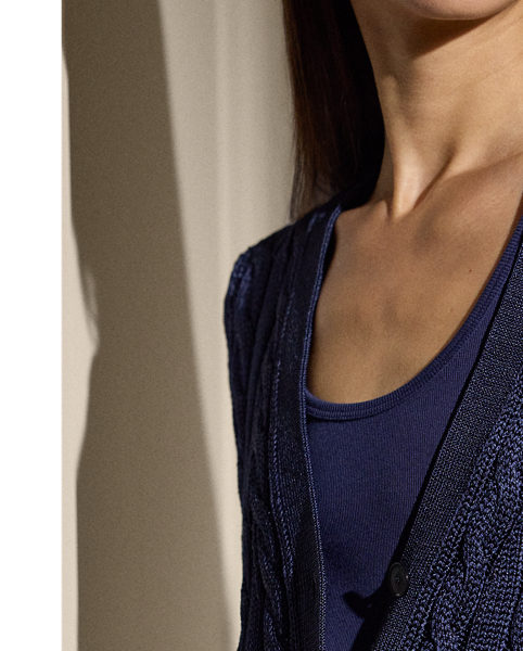 Our iconic cable-knit cardigan jumper combines impeccable crafting with the refined luxury of high-shine silk, which is specially selected for its soft hand feel and beautiful sheen.