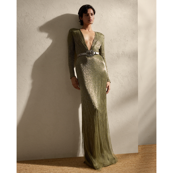 Showcasing Mr Lauren's commitment to fine craftsmanship, the Stacy's body-skimming column silhouette is meticulously hand-embroidered by a team of seven master artisans. Using a traditional Aari technique, glass bugle beads in two distinctive shades are positioned sporadically across the bodice and down the skirt, creating a linear dégradé effect. This romantic evening style features a dramatic plunging neckline framed by delicate ruching.