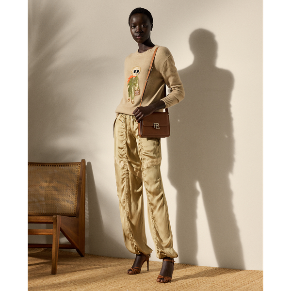 The Killian is designed with an array of considered details, including a comfortable drawcord waistband, angled zip pockets, grosgrain trim and triple-needle topstitching. Cut for a mid-rise with a parachute-style silhouette, these trousers feature an adjustable drawcord down each leg for a ruched appearance. One hundred per cent silk charmeuse is woven in a soft satin structure to create a lustrous finish.