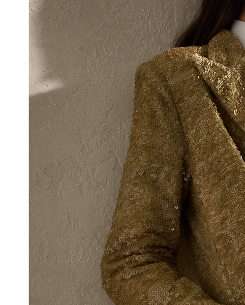 Cut for a relaxed fit and finished with traditional tailoring details, including peak lapels, waist darts and a vented back hem, the menswear-inspired Macy coat undergoes a unique artisanal process to achieve its stunning appearance. Using 100 percent cotton tulle as the base, this coat is meticulously embroidered by five highly trained technicians with 760,000 overlapping sequins. Once applied, a dip-dye technique is used to give the sequins various shades of colour, making each piece truly one of a kind.