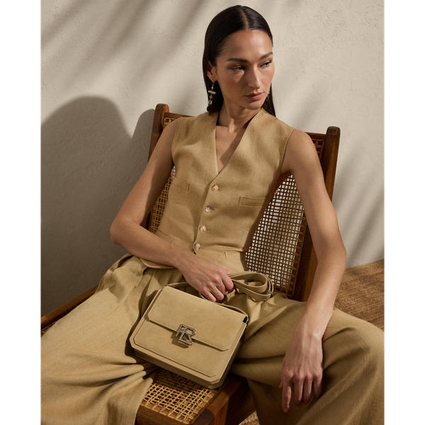 The menswear-inspired Jaiden is carefully crafted from a luxurious blend of silk and linen, which is custom-woven in a beautiful twill structure for a rustic yet soft hand feel. Cut for a slim fit, this waistcoat is tailored with welt pockets, slimming waist darts and an adjustable back belt.