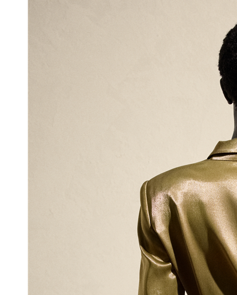 Melding the soft construction of a men's robe with the design elements of a structured blazer, the Quinton is  Ralph Lauren Lauren's modern rendition of a women's smoking jacket. Made in Italy with a luxurious satin fabrication that was specially developed with metallicised yarns woven on a fine silk-blend warp to achieve a fluid metal effect, this jacket is finished with a self-belt that's intended to be knotted at the waist.