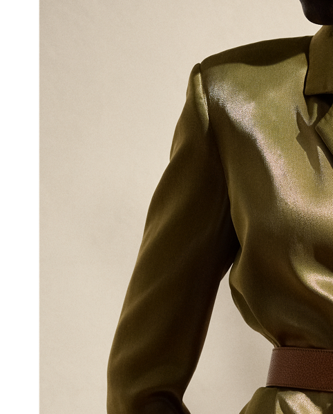 Melding the soft construction of a men's robe with the design elements of a structured blazer, the Quinton is  Ralph Lauren Lauren's modern rendition of a women's smoking jacket. Made in Italy with a luxurious satin fabrication that was specially developed with metallicised yarns woven on a fine silk-blend warp to achieve a fluid metal effect, this jacket is finished with a self-belt that's intended to be knotted at the waist.