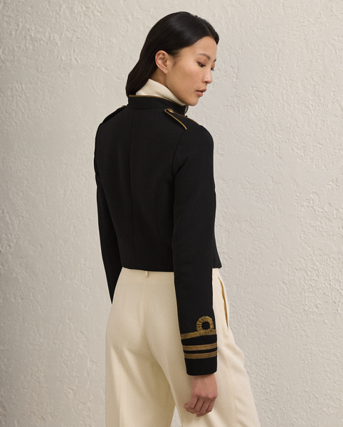 Cut for a slim, cropped fit, the Carraway jacket is crafted in Italy from double-faced wool crepe and features elevated design elements, including brass buttons embossed with Ralph Lauren Lauren's monogram and metallic soutache embroidery.