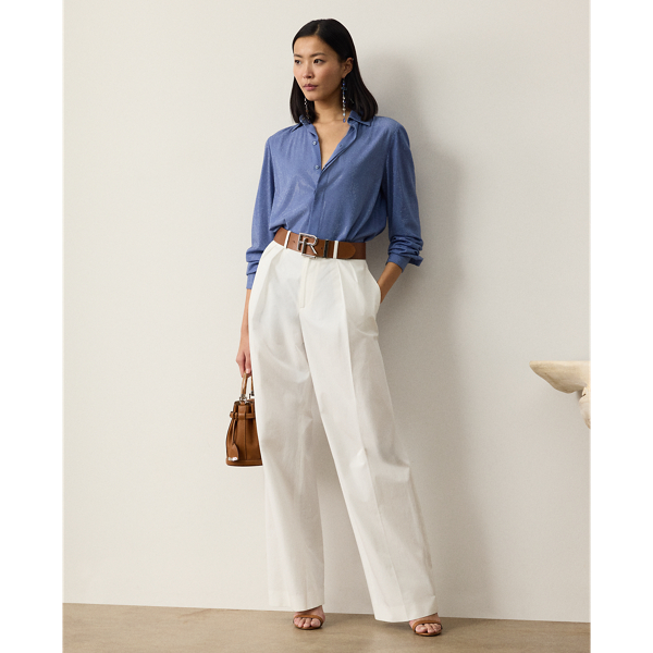 Tailored with pleats, waist darts and crisp creases down each leg, the high-rise Jody trouser is crafted from 100% cotton, which is specially washed for a soft hand feel.