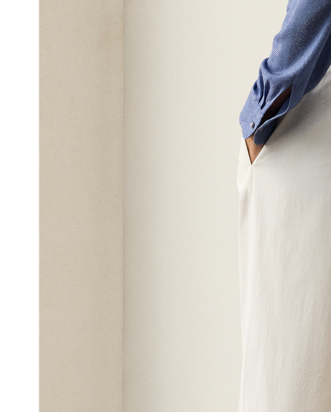 Tailored with pleats, waist darts and crisp creases down each leg, the high-rise Jody trouser is crafted from 100% cotton, which is specially washed for a soft hand feel.