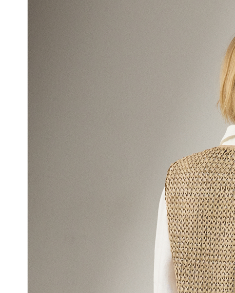 Utilising the dedicated crafting of eight highly skilled artisans, the Tabetha waistcoat undergoes a multi-step artisanal process to achieve its unique silhouette. To begin, the graphic designer and the pattern department collaborate to create the pattern paper used for this style. Experienced cutters select the highest quality skins for this piece, cutting the leather into 5 cm strips and weaving them together by hand to follow the pattern placement and form the panels that make up the waistcoat's timeless design. Finally, tonal lambskin piping is applied to frame the garment. Additional touches, including a lamb-suede drawcord with "RL"-engraved imitation horn cord ends and besom pockets, complete the look.