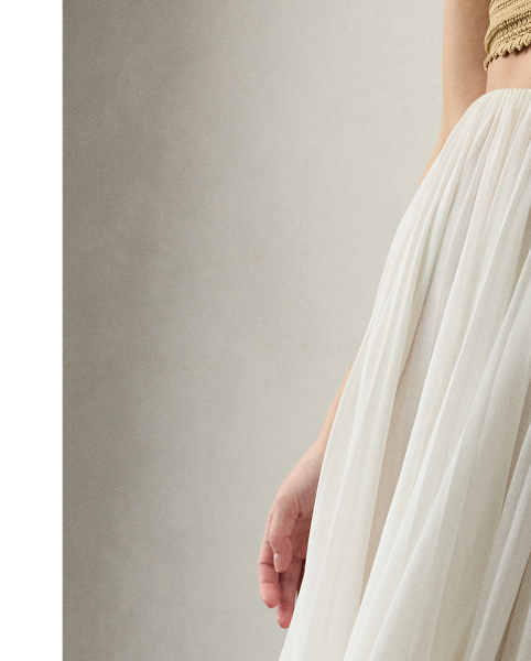 Crafted in Italy with breezy cotton voile, this version of the Trivelas skirt undergoes an intensive process to achieve its pleated, shimmering finish. Six specialised technicians first utilised an innovative fabric-manipulation technique, known as soleil, to meticulously fold the fabric to create its pleated effect. Next, a total of 280,000 shimmering sequins are applied in rows along the bottom of the skirt, creating a light catching finish that showcases Mr Lauren's commitment to quality crafting.