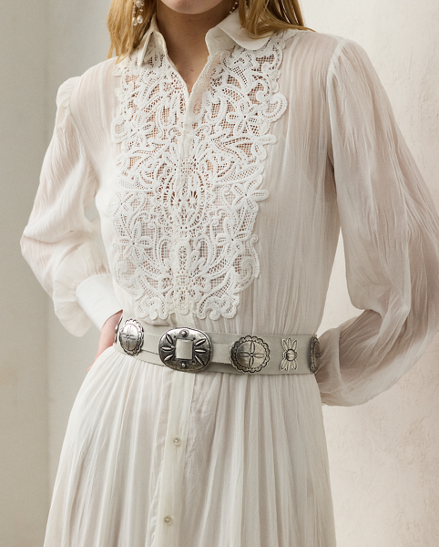 Capturing the relaxed sophistication that defines summer in the Hamptons, the Seymour day dress is crafted with lightweight, breathable cotton voile, which is finely woven to create micro-pleats for added volume and sweeping movement. With an array of romantic elements, including blouson sleeves, extended sleeve cuffs and a rounded collar, this dress spotlights an embroidered bib, which is formed using a special punch-needle technique that reproduces a macramé lace effect.