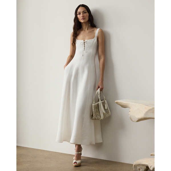 Crafted with rustic linen-blend canvas that's specially washed for a soft hand feel, the ankle-grazing Sonali dress is distinguished by its romantic fit-and-flare silhouette and a lace-up quarter-placket. Equipped with side on-seam pockets for a casual sensibility, this warm-weather style is tailored with princess seams for a flattering fit.