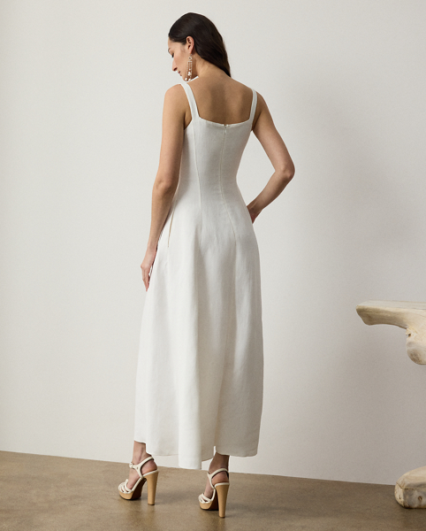 Crafted with rustic linen-blend canvas that's specially washed for a soft hand feel, the ankle-grazing Sonali dress is distinguished by its romantic fit-and-flare silhouette and a lace-up quarter-placket. Equipped with side on-seam pockets for a casual sensibility, this warm-weather style is tailored with princess seams for a flattering fit.