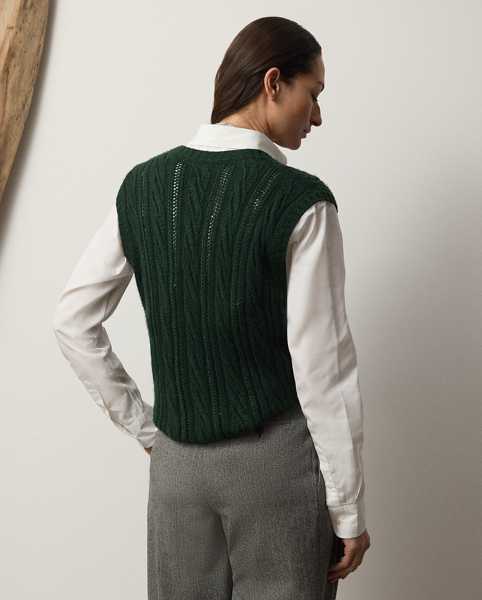 Inspired by classic menswear style, this relaxed-fitting cable-knit sleeveless jumper is artfully designed by two highly trained artisans using silk-and-cashmere yarns, creating a luxuriously soft hand feel and a novelty cable stitch.