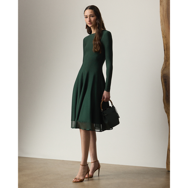 Celebrating timeless elegance with a fluid silhouette and artisanal crafting, this long-sleeve jumper dress is spun with two viscose yarns in different thread counts, creating an interlock fabric that provides a soft, smooth hand feel and a subtle lustre. A horizontally-knit body produces a figure-hugging bodice that flows beautifully into a perfectly draped skirt, while sheer details at the cuffs and hem lends to this style's breezy sensibility.