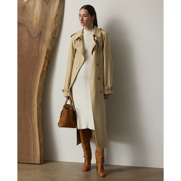 Spun from plaited silk yarns for a luxurious hand feel, this jumper day dress features a travelling rib motif down the body, highlighting the natural curves of the waist. Its slim-fitting silhouette combines a tee-style bodice with a subtle A-line skirt.