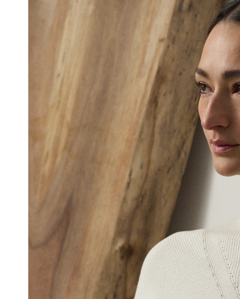 Spun from plaited silk yarns for a luxurious hand feel, this jumper day dress features a travelling rib motif down the body, highlighting the natural curves of the waist. Its slim-fitting silhouette combines a tee-style bodice with a subtle A-line skirt.