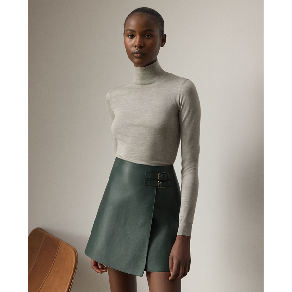 A timeless wardrobe staple,  Ralph Lauren Lauren Collection puts a luxurious spin on the mockneck jumper with a stretch-infused silk jersey fabrication and a slim fit.