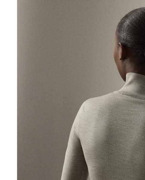 A timeless wardrobe staple,  Ralph Lauren Lauren Collection puts a luxurious spin on the mockneck jumper with a stretch-infused silk jersey fabrication and a slim fit.