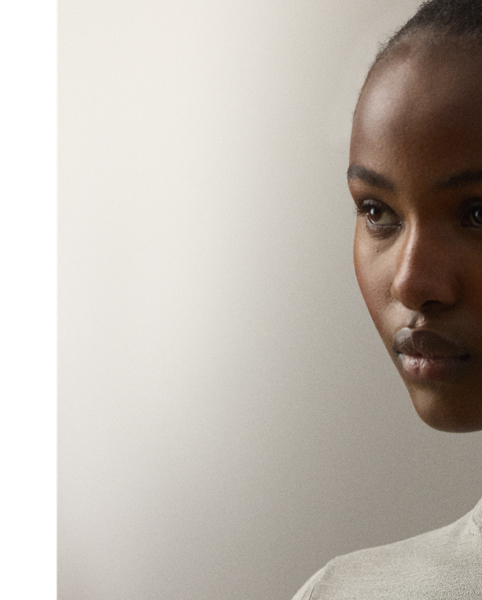 A timeless wardrobe staple,  Ralph Lauren Lauren Collection puts a luxurious spin on the mockneck jumper with a stretch-infused silk jersey fabrication and a slim fit.