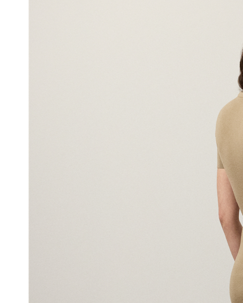 A hybrid of luxurious materials, the season's Lindsay dress unites two one-of-a-kind fabrics to create its clean sheath silhouette. For the crewneck, sleeves and back, a rib-knit wool-and-silk blend is used, while sumptuous lamb-suede panels with edge-stitching details grace the front. This timeless style comes with a self-belt centred by a signature " Ralph Lauren Lauren"-engraved metal buckle.