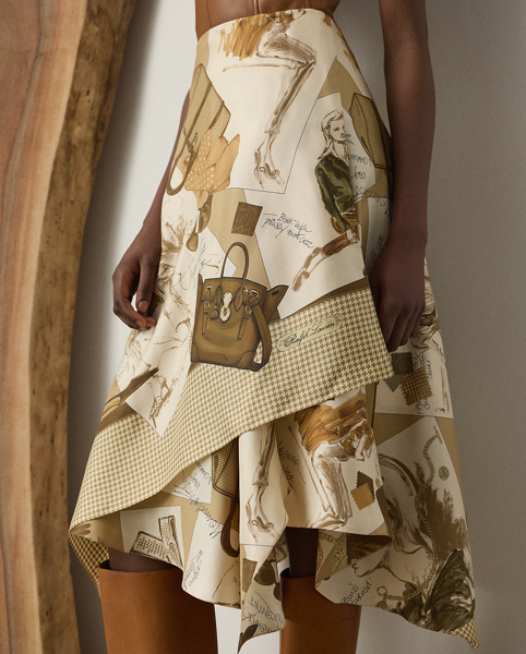 Crafted from silk twill, the Glenn skirt is printed in a renowned Italian mill in Como with the season's diary-inspired pattern – a beautiful collection of motifs depicting various Ralph Lauren Lauren sketches and accessories in a versatile, neutral palette. Inspired by the effortless drape created by scarves, this A-line style is designed with a panelled construction and a subtle, asymmetrical handkerchief hem for sweeping movement with each step.