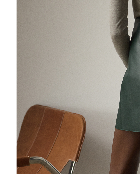 An avid automobile collector, Mr Lauren's vast car collection serves as a key source of inspiration for Pre-Autumn 2025 Collection, which is evident in the Kyler skirt. Cut for a mini A-line silhouette, the Kyler is crafted from supple nappa lambskin in the season's dark racing green hue and detailed with lambskin-trimmed roller buckles in an antiqued brass finish-two design elements directly inspired by one of Mr Lauren's iconic vehicles. A convenient wrap closure offers ease of wear.