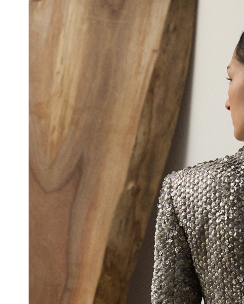 Bringing an effortlessly cool sensibility to traditional tailoring, this novelty jacket is cut for a slim, cropped fit and features notch lapels, a two-button closure and flapped pockets. Starting with an exclusive silk satin base, a team of six highly trained technicians embroidered the Fawn jacket with a mix of round- and oval-shaped metallic sequins, creating rich dimension and texture. Touches of rhinestones are applied throughout, emphasising this style's shimmering effect.