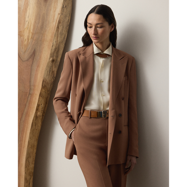 Inspired by menswear, the Harlee jacket is cut for a relaxed fit for a chic yet effortless silhouette. Traditionally tailored with besom pockets, peak lapels and waist darts, this style is crafted in Italy from stretch cady – a comfortable fabrication made with highly twisted crepe yarns woven with moderate stretch for a supple, fluid drape and lightweight feel.