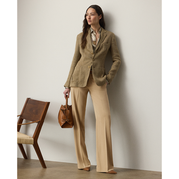 Traditionally tailored with leg creases and waist darts, the new-season Corrine redefines the flat-front trouser with a low rise and a full-length, straight-leg silhouette. This version is woven with Italian wool trench in a compact weave specially selected for its structured form and stunning drape.
