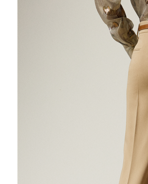 Traditionally tailored with leg creases and waist darts, the new-season Corrine redefines the flat-front trouser with a low rise and a full-length, straight-leg silhouette. This version is woven with Italian wool trench in a compact weave specially selected for its structured form and stunning drape.