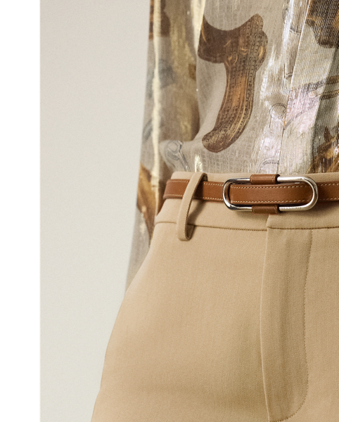 Traditionally tailored with leg creases and waist darts, the new-season Corrine redefines the flat-front trouser with a low rise and a full-length, straight-leg silhouette. This version is woven with Italian wool trench in a compact weave specially selected for its structured form and stunning drape.