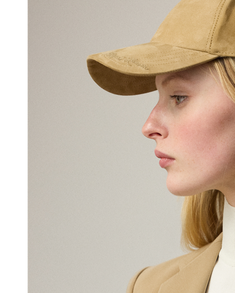 Equestrian-style hacking pockets and our signature "RL" and crown-engraved buttons adorn this season's version of the Parker jacket, which is woven from Italian wool gabardine in a compact weave specially selected for its structured form and stunning drape. Traditional men's tailoring techniques ensure it maintains its slim, waist-defining silhouette for years to come.