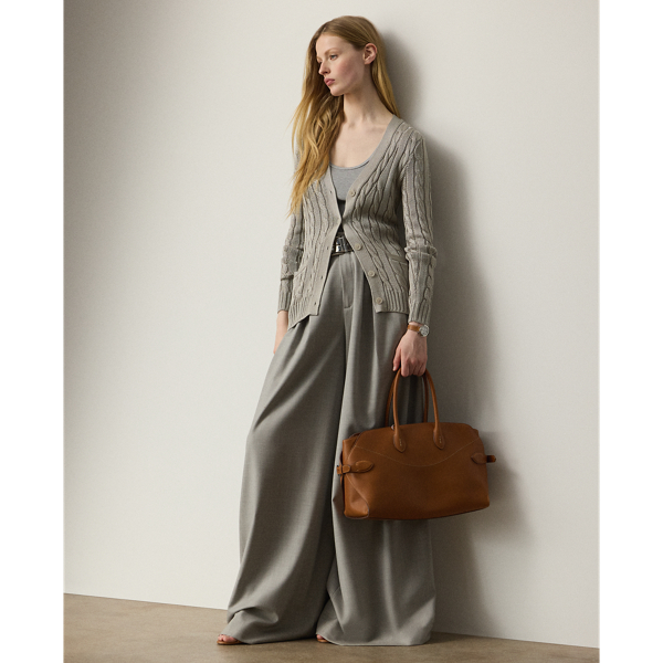 Designed with an array of sleek tailoring elements, including two inverted pleats, waist darts, side on-seam pockets and a clean waist, this iteration of the Greer trouser is crafted with extra-fine worsted wool, selected especially for its brushed, lofty finish and remarkable drape. A high rise and a wide-leg silhouette lend to its elegant look.