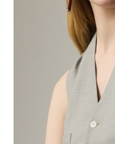 The menswear-inspired Jaiden is carefully crafted from extra-fine worsted wool, which is specially selected for its brushed, lofty finish and remarkable drape. Cut for a slim fit, this waistcoat is tailored with welt pockets, slimming waist darts and an adjustable back belt.