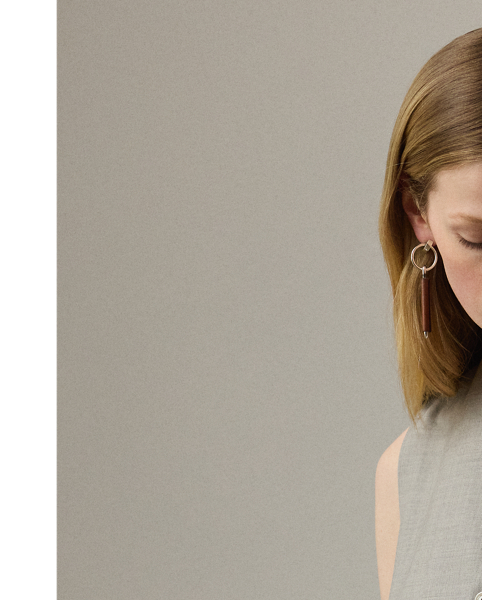 The menswear-inspired Jaiden is carefully crafted from extra-fine worsted wool, which is specially selected for its brushed, lofty finish and remarkable drape. Cut for a slim fit, this waistcoat is tailored with welt pockets, slimming waist darts and an adjustable back belt.