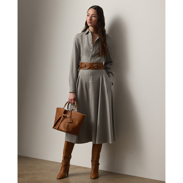 The shirtdress – one of  Ralph Lauren Lauren's signature silhouettes – is revamped this season in the Safford. Crafted in Italy from extra-fine worsted wool selected especially for its brushed, lofty finish and remarkable drape, this calf-grazing day dress is designed with princess seams, curved skirt seams and side on-seam pockets. A buckled self-belt with a petite square-shaped buckle cinches the waist for a defined figure.